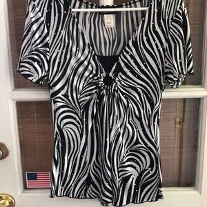 Brittany Black sequined top.